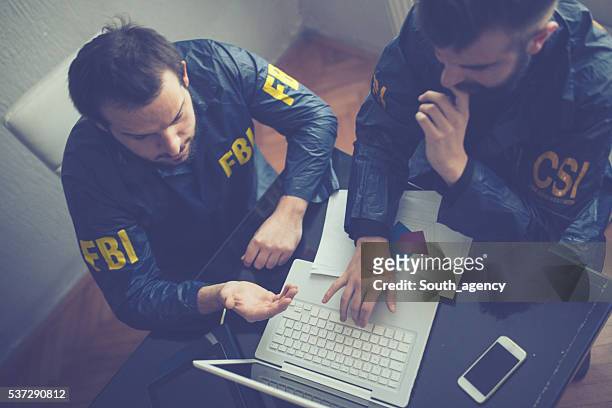 fbi and csi agents - fbi stock pictures, royalty-free photos & images