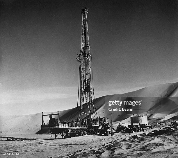 An Arabian-American Oil Company drilling rig at Rub' al Khali in the Arabian Peninsula, Saudi Arabia, circa 1955. The Arabian-American Oil Company...