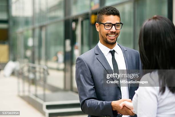 i think we have a deal. - lawyer handshake stock pictures, royalty-free photos & images