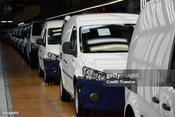 cars on the production line - combi van stock pictures, royalty-free photos & images