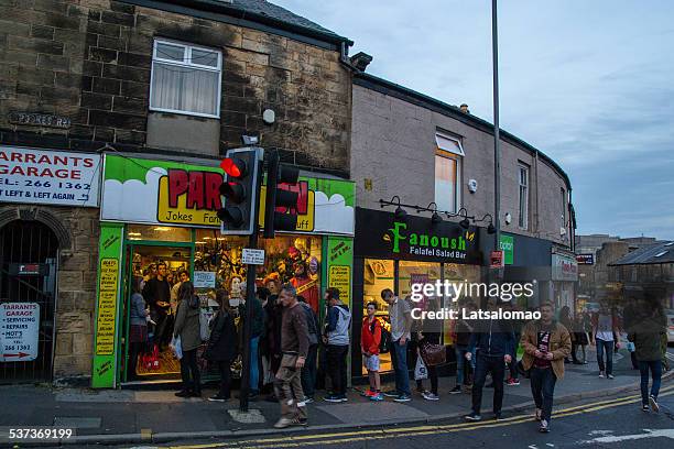 waiting in line for a halloween custom. - sheffield street stock pictures, royalty-free photos & images