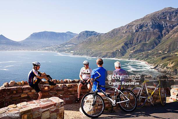 cyclist, bike, riders, chapmans peak, cape town, scenic, steep,resting, - chapmans peak stock pictures, royalty-free photos & images