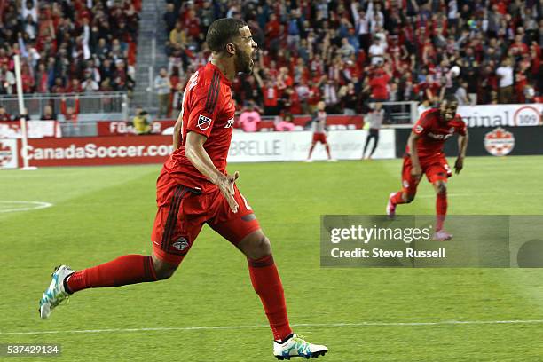 Toronto FC forward Jordan Hamilton celebrates his first goal as the Toronto FC beats Montreal Impact 4-2 in the first leg of the Amway Canadian...