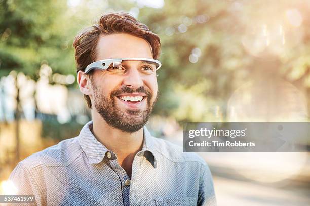 man using smart glass. - white shirt stock pictures, royalty-free photos & images