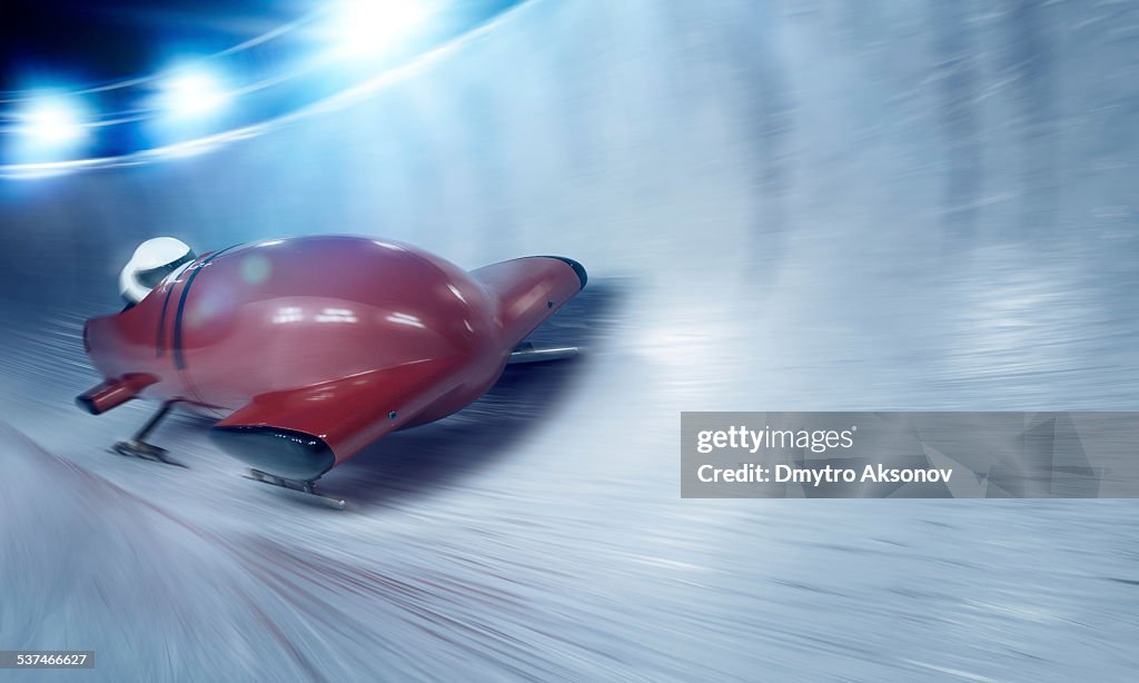 Bobsleigh team at night