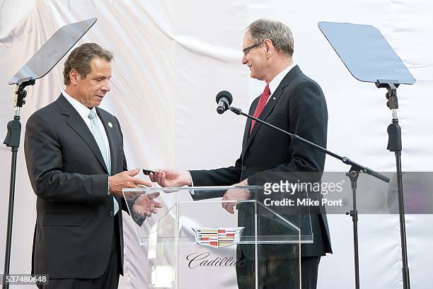 Governor of New York Andrew Cuomo and Executive Vice President of General Motors, and President at Global Cadillac Johan de Nysschen attends the...
