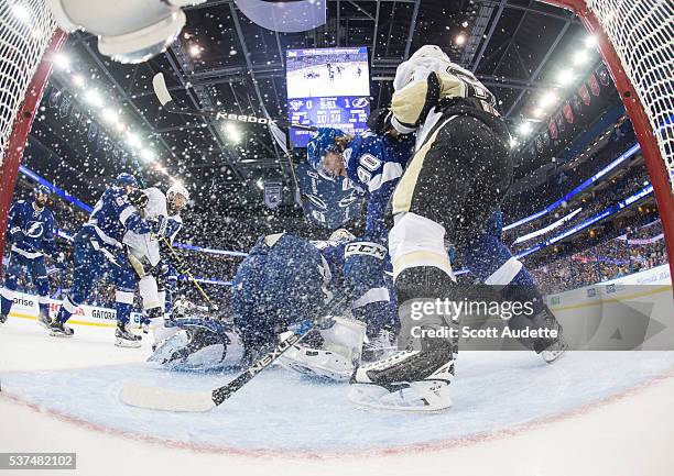 Goalie Andrei Vasilevskiy of the Tampa Bay Lightning makes a save against the Pittsburgh Penguins during the first period of Game Four of the Eastern...