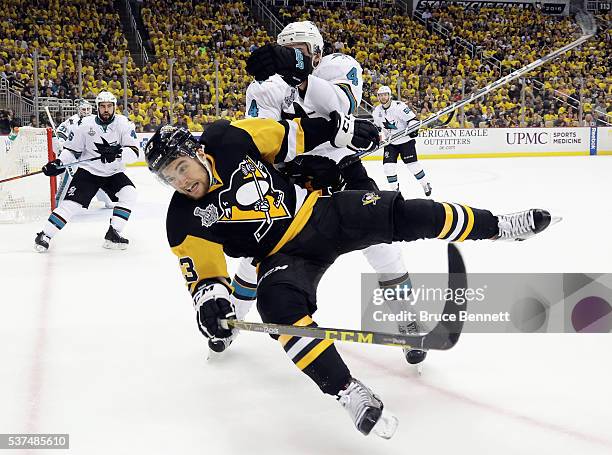 Brenden Dillon of the San Jose Sharks checks Conor Sheary of the Pittsburgh Penguins during the third period in Game Two of the 2016 NHL Stanley Cup...