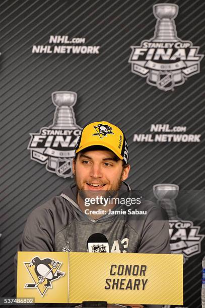 Conor Sheary of the Pittsburgh Penguins speaks with the media during a post-game press conference after scoring the game-winning goal to defeat the...