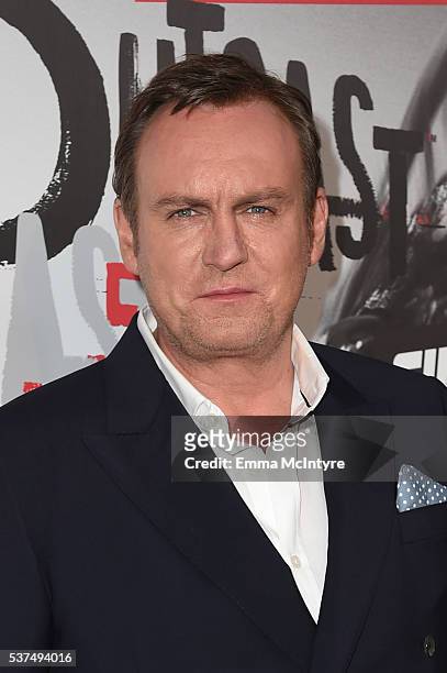 Actor Philip Glenister arrives at the premiere of Cinemax's "Outcast" on June 1, 2016 in Los Angeles, California.