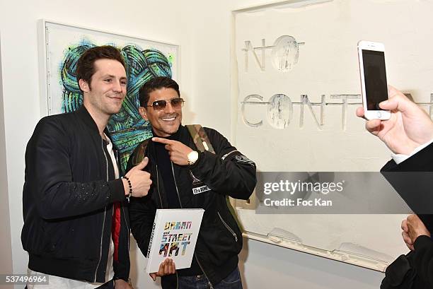 Actor Said Taghmaoui and a guest attend the Street Art Exhibition Preview in Galerie Laurent Strouk as part of "Nocturne Rive Droite" At Art...