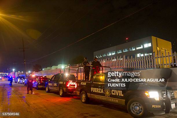 Police gather outside the Topo Chico prison in the northern city of Monterrey in Mexico on June 2, 2016. At least three people died in a riot in a...