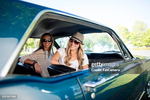 girl friends going for a drive - spring break road trip stock pictures, royalty-free photos & images