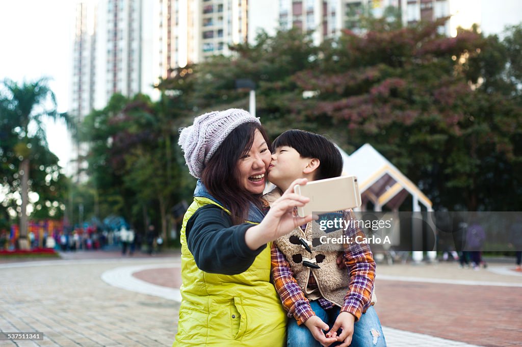 Mom and son taking selfie