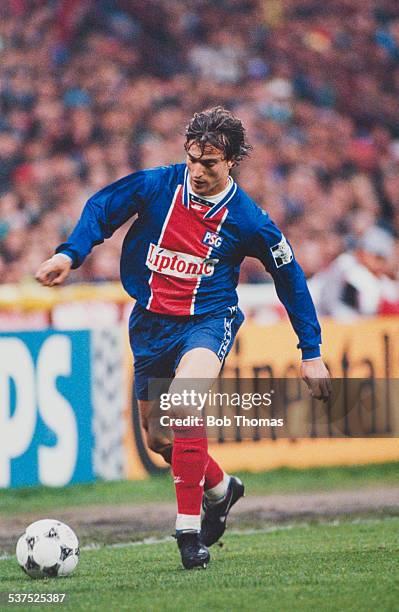 French footballer David Ginola in action for Paris Saint Germain during the European Cup semi-final, 2nd leg against AC Milan at Parc des Princes,...