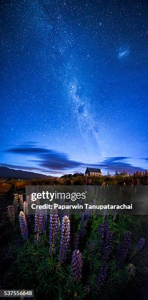 church of a good shepherd with milkyway above - christchurch stock-fotos und bilder