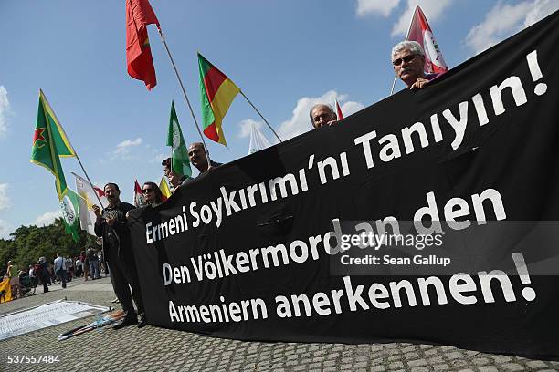 Activists demand the recognition of the Armenian genocide outside the Reichstag, where the Bundestag was scheduled to vote on a resolution on the...