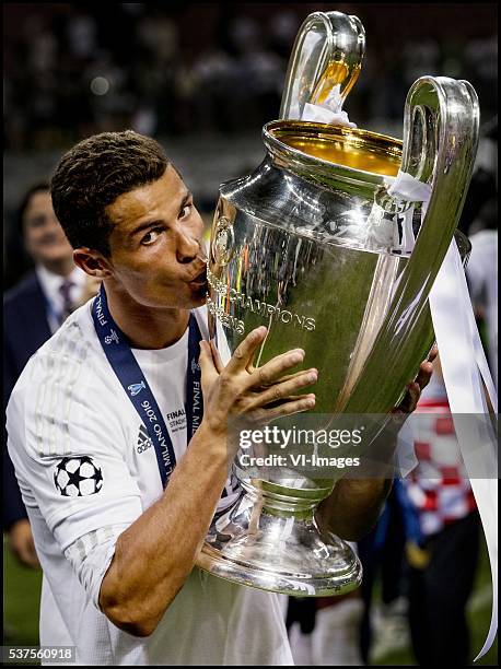 Cristiano Ronaldo of Real Madrid kisses the Cup after winning the Champions League final during the UEFA Champions League final match between Real...