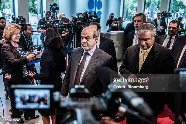 Fayyad Al-Nima, Iraq's deputy oil minister, center, arrives for the 169th Organization of Petroleum Exporting Countries conference in Vienna,...
