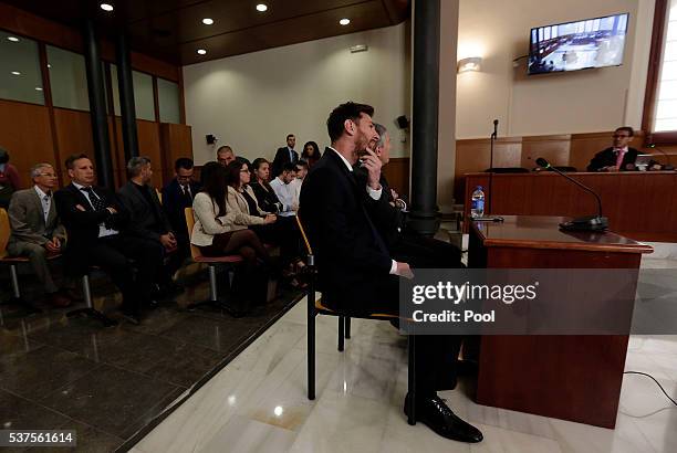 Lionel Messi of FC Barcelona and his father Jorge Horacio Messi seen inside the court during the third day of the trial on June 2, 2016 in Barcelona,...