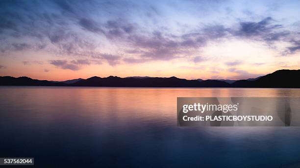 sunset of lake tazawa - 秋田県 ストックフォトと画像