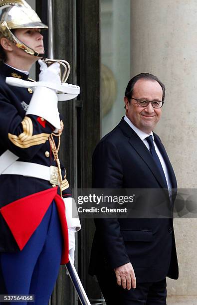 French President Francois Hollande waits prior to attend a meeting with President of Chile Michelle Bachelet at the Elysee Presidential Palace on...