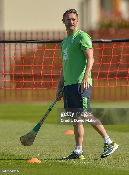 Cork , Ireland - 2 June 2016; Robbie Keane of Republic of Ireland holding a hurley during squad training in Fota Island Resort, Fota Island, Cork.