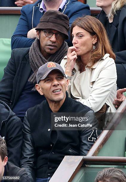 Manu Katche and his wife Laurence Katche, below them Roshdy Zem attend day 11 of the 2016 French Open held at Roland-Garros stadium on June 1, 2016...