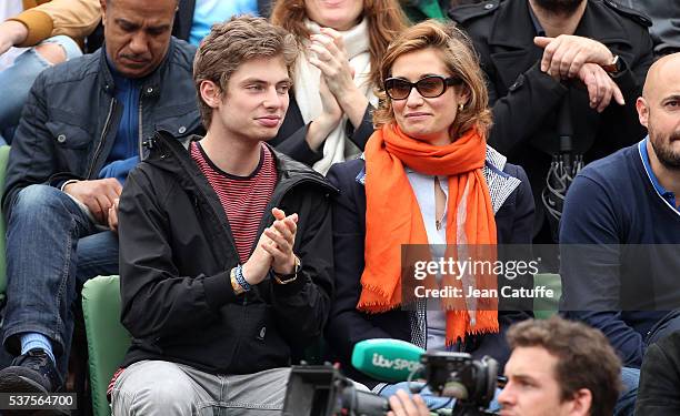 Emmanuelle Devos with her son Raphael attend day 11 of the 2016 French Open held at Roland-Garros stadium on June 1, 2016 in Paris, France.