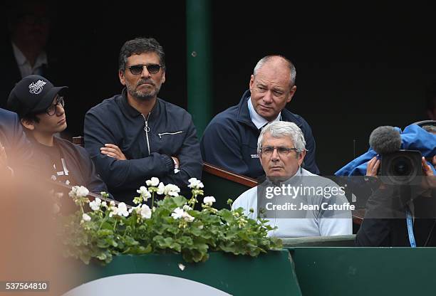 Pascal Elbe and Michel Boujenah attend day 11 of the 2016 French Open held at Roland-Garros stadium on June 1, 2016 in Paris, France.