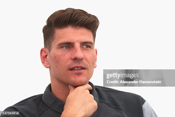 Mario Gomez of Germany looks on during team Germany`s media day on day 10 of the German national team trainings camp on June 2, 2016 in Ascona,...