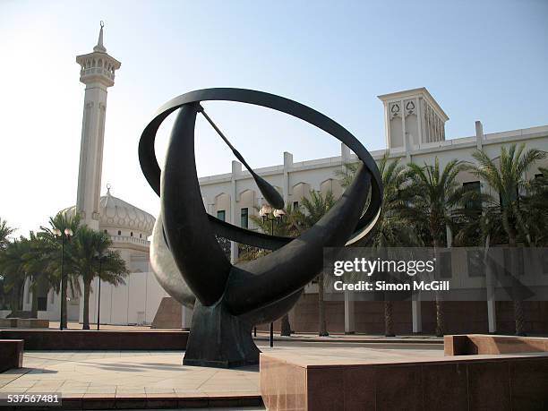 Sculpture with Bastakiya Mosque in the background, Bastakiya Historic Quarter, Bur Dubai, Dubai, United Arab Emirates