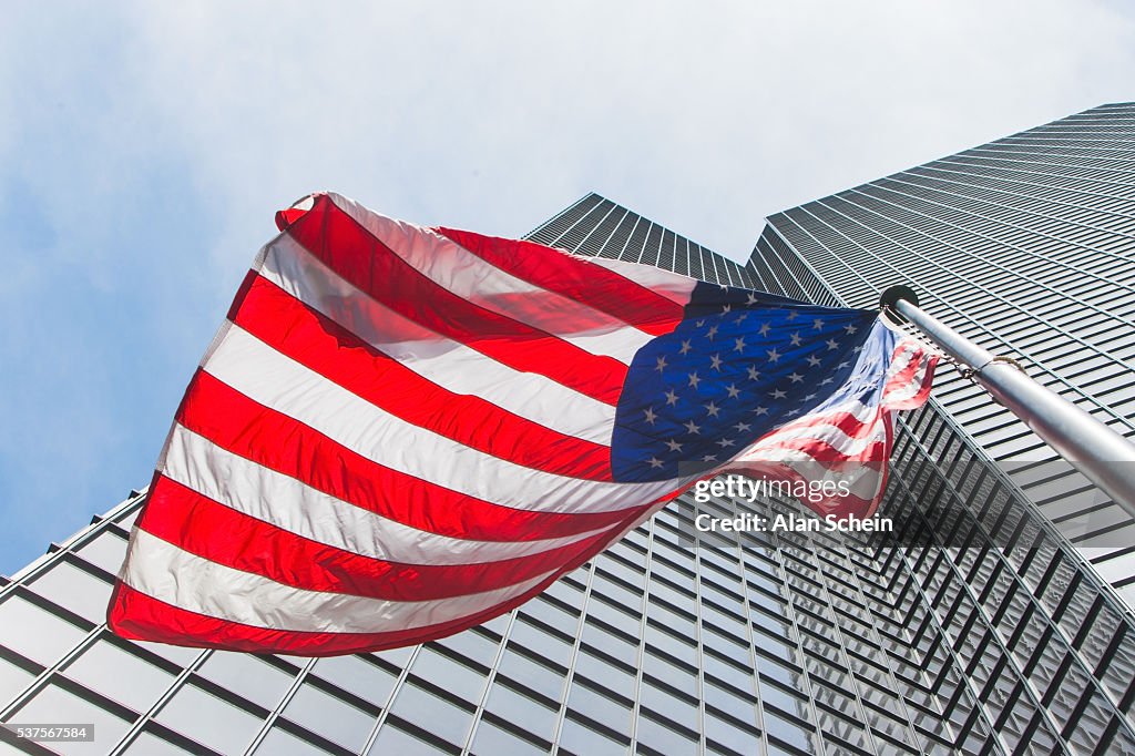 American flag in front of building, nyc