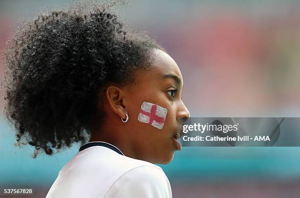 Young fan with an England St George's cross flag painted on her face"n during The FA Trophy Final match between Grimsby Town and Halifax Town at...