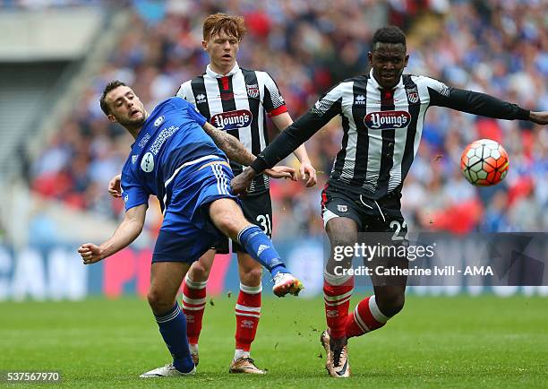 Connor Hughes of Halifax Town and Aristote Nsiala of Grimsby Town during The FA Trophy Final match between Grimsby Town and Halifax Town at Wembley...