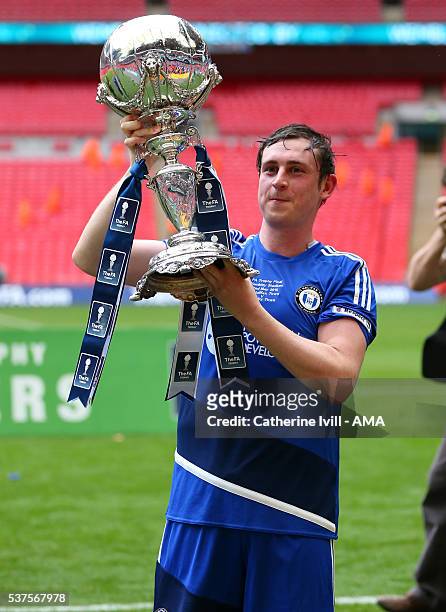 Sam Walker of Halifax Town with the trophy after The FA Trophy Final match between Grimsby Town and Halifax Town at Wembley Stadium on May 22, 2016...