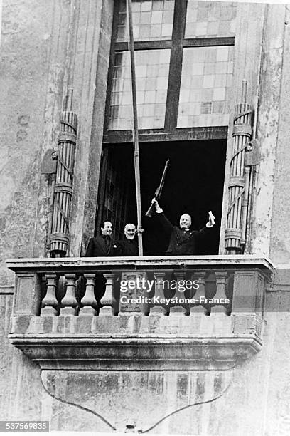 Benito Mussolini presents the rifle and the book to the students gathered on the Palace Square in Venice at the end of the academic semester on May...