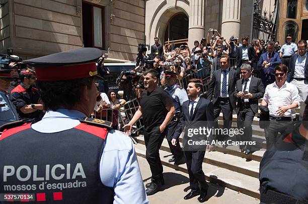 Lionel Messi leaves the courthouse followed by his father Jorge Horacio Messi and his brother Rodrigo Messi on June 2, 2016 in Barcelona, Spain....