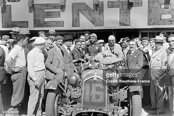 Drivers Sir Henry Birkin and Lord Howe on Alfa Romeo 8C 2300 LM, winners of the 24 Hours of Le Mans in June 1931, in Le Mans, France.