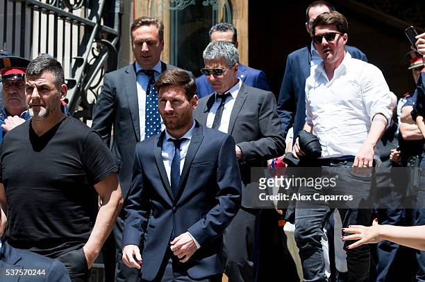 Lionel Messi leaves the courthouse followed by his father Jorge Horacio Messi and his brother Rodrigo Messi on June 2, 2016 in Barcelona, Spain....