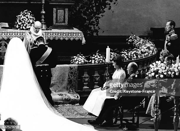 The religious marriage of Prince Harald with Sonja Haraldsen at the cathedral with Sonja's mother, King Olav V and the Count Flemming of Rosenborg,...