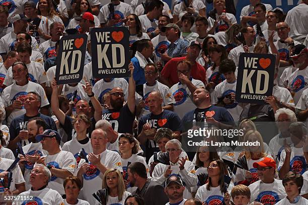 Oklahoma City Thunder fans hold up signs during Game Four of the Western Conference Finals against the Golden State Warriors during the 2016 NBA...