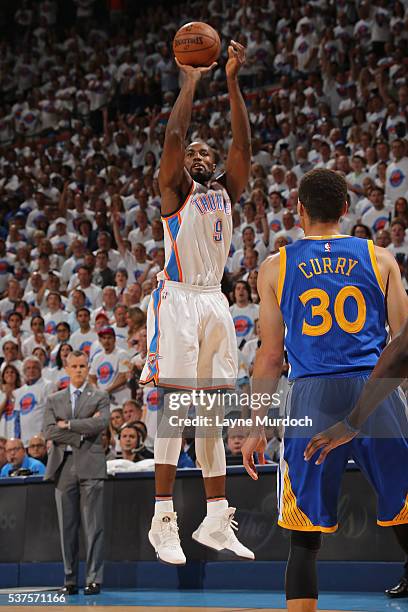 Serge Ibaka of the Oklahoma City Thunder shoots a three point basket in Game Four of the Western Conference Finals against the Golden State Warriors...