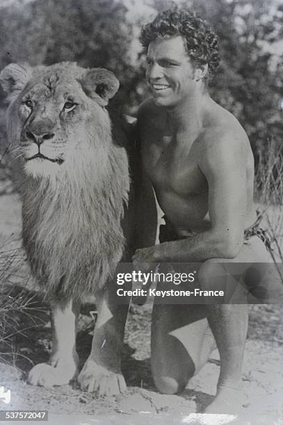 As Johnny Weissmuller , Buster Crabbe, the famous Olympic swimmer, will act in the film 'The Son of Tarzan' on February 9, 1933.