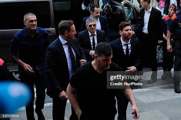 Barcelona's football star Lionel Messi arrives at the courthouse on June 2, 2016 in Barcelona, where Messi and his father are to face judges in a tax...