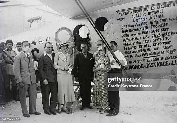 The Air Minister Pierre Cot poses in Marignane with aviators Paul Codos and Maurice Rossi and their wives in front of the prestigious 'Bleriot 110'...