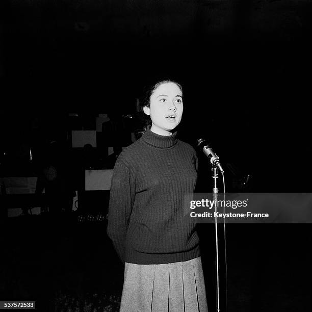 Italian singer Gigliola Cinquetti trains her songs on the scene of the Olympia on April 21, 1965 in Paris, France.