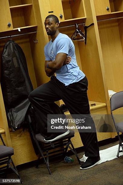 Draymond Green of the Golden State Warriors arrives at his locker before Game Five of the Western Conference Finals against the Oklahoma City Thunder...