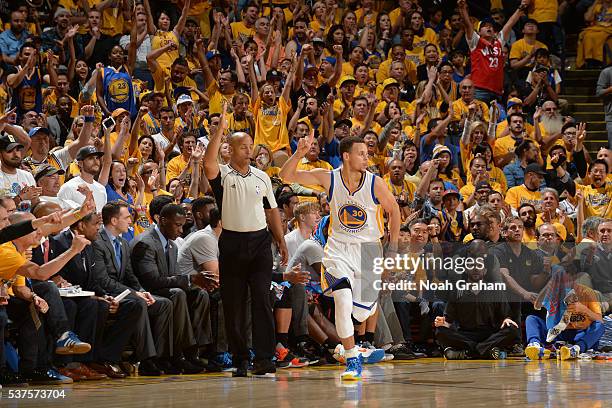 Stephen Curry of the Golden State Warriors celebrates a shot in Game Five of the Western Conference Finals against the Oklahoma City Thunder during...