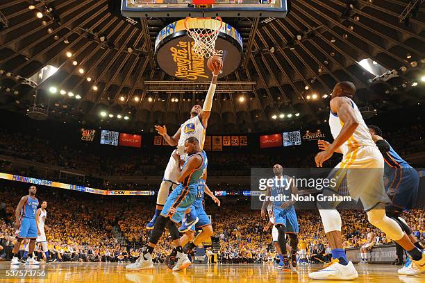 Marreese Speights of the Golden State Warriors drives to the basket against the Oklahoma City Thunder in Game Five of the Western Conference Finals...